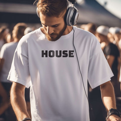 Showing an electronic artist djing in an event wearing a tee that says HOUSE on it