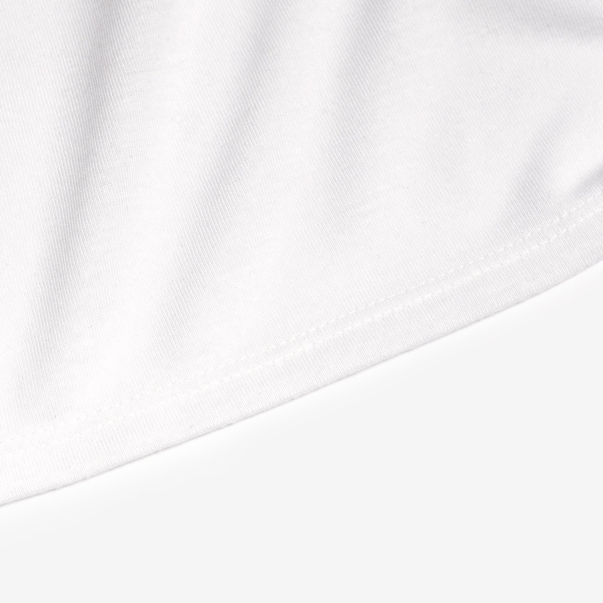 a close up of a white shirt with a black tie