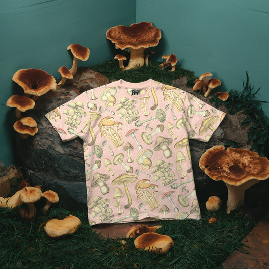 Mushroom Pattern Tee on a hanger in the woods