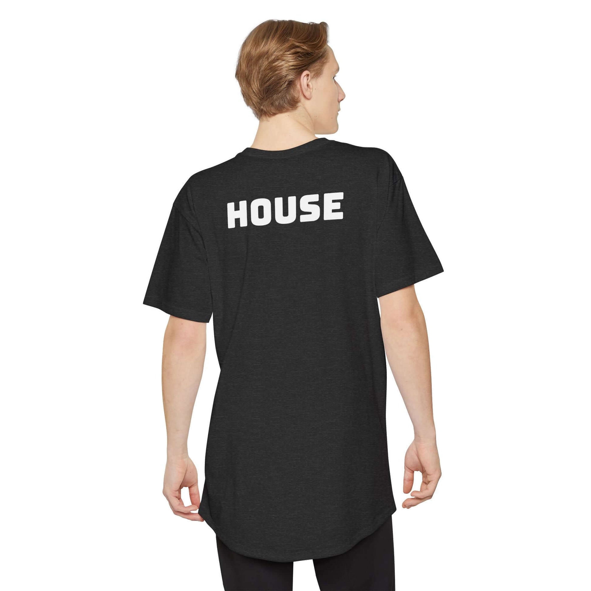 Model wearing the Black version of the oversized HOUSE tee from the back, showing the drop-tail 